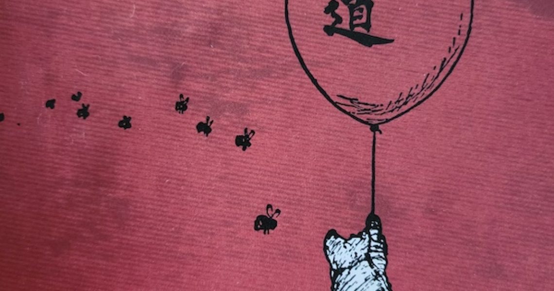 red mottled background with black and white pooh bear flying from a ballon. little black bees scatter to the left, inside the ballon is a Chinese symbol and above it the words "The Tao of Pooh"